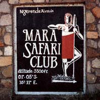 Mara Safari Club-Wegweiser auf dem Ngerende Airstrip. Ol Chorro Orogwa Group Ranch (Masai Mara), Kenia. / Mara Safari Club way sign at Ngerende Airstrip. Ol Chorro Orogwa Group Ranch (Masai Mara), Kenya. / (c) Walter Mitch Podszuck (Bwana Mitch) - #980905-17